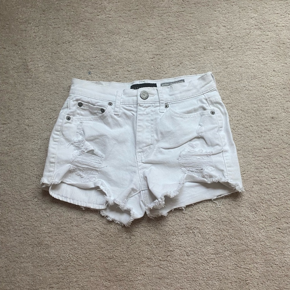 white ripped jean shorts